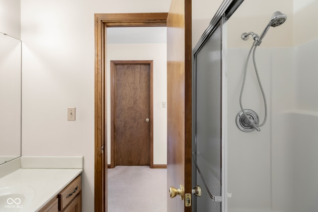 bathroom featuring vanity and walk in shower