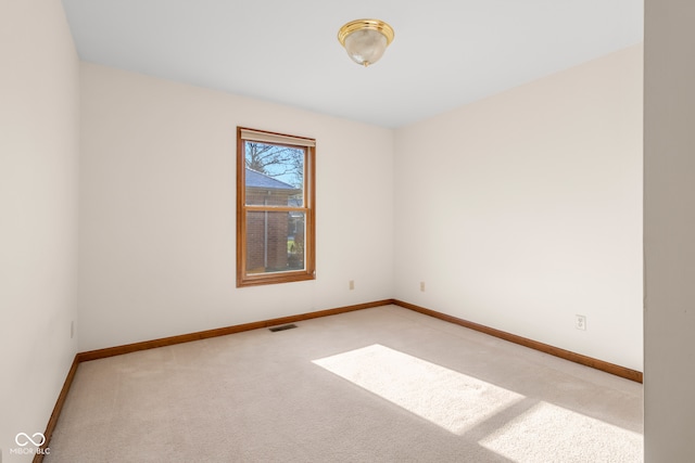 view of carpeted spare room