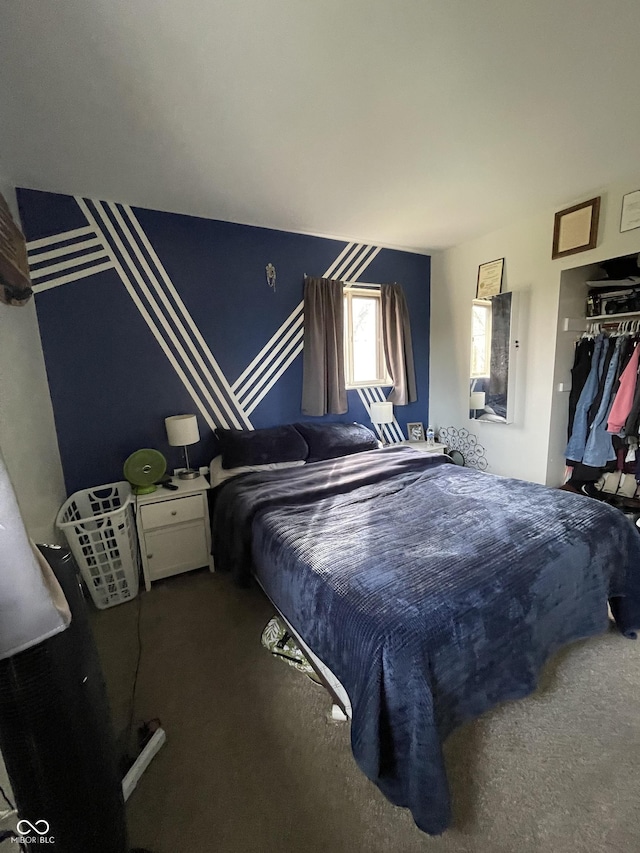 bedroom with carpet floors and a closet