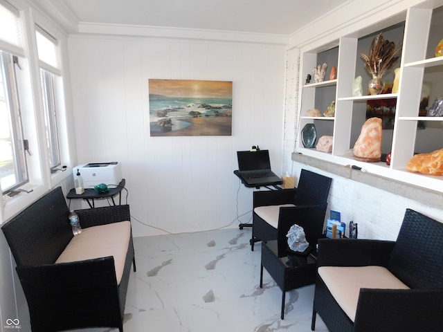 office with plenty of natural light, crown molding, and wooden walls