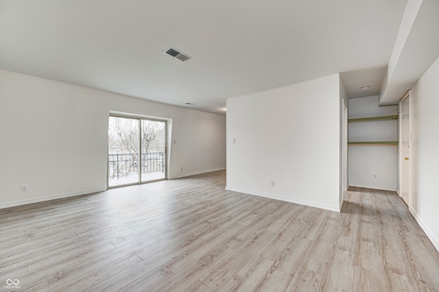 empty room featuring light hardwood / wood-style floors