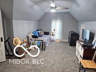 carpeted bedroom featuring ceiling fan and vaulted ceiling