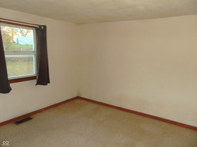 view of carpeted spare room