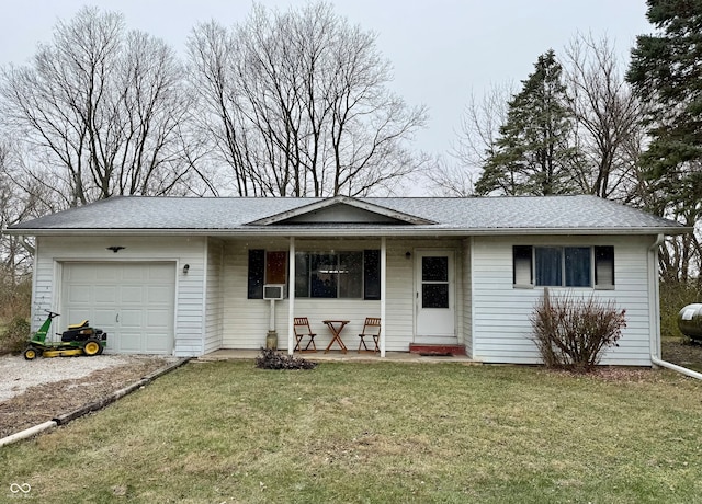 ranch-style house with a garage and a front yard