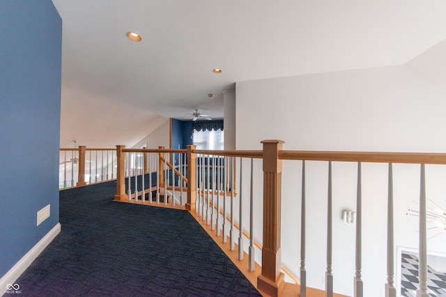 corridor featuring carpet flooring