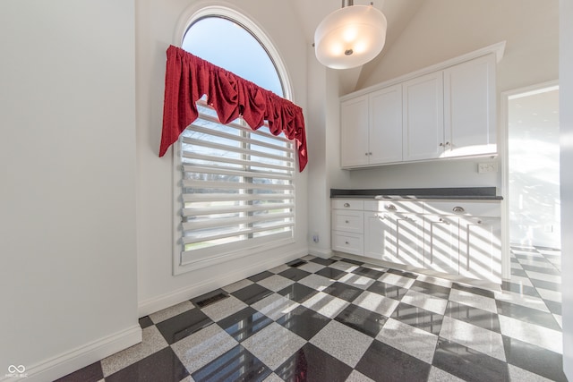 kitchen with white cabinets