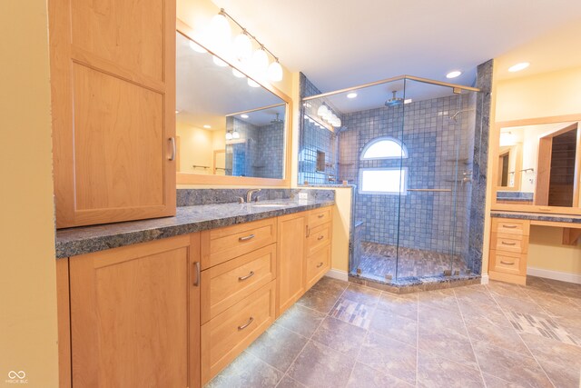 bathroom featuring vanity and walk in shower