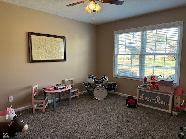 game room featuring ceiling fan and carpet flooring