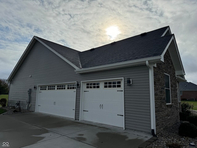 view of home's exterior with a garage