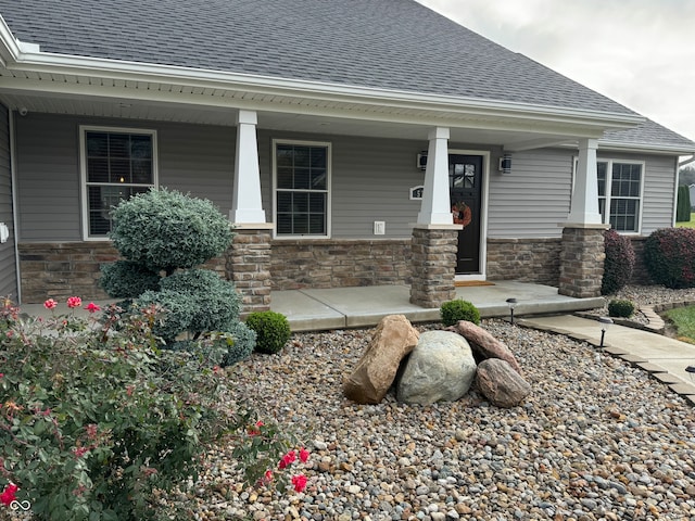 entrance to property with covered porch