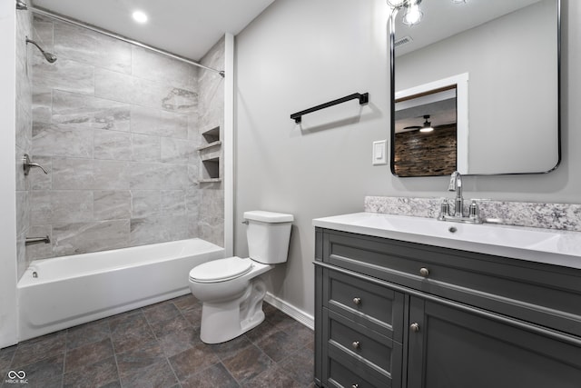 9462 N Rushville Rd, Knightstown, IN 46148 - full bath with toilet, vanity, baseboards, bathing tub / shower combination, and stone finish floors