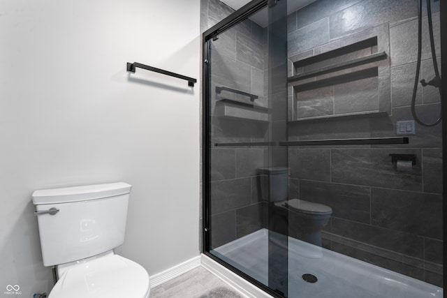 9462 N Rushville Rd, Knightstown, IN 46148 - full bath featuring toilet, a shower stall, and baseboards