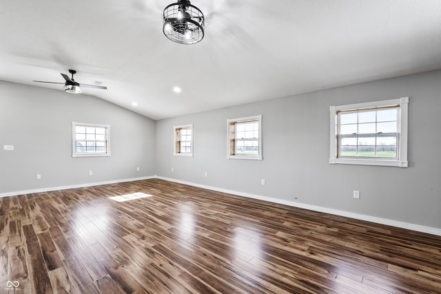 9462 N Rushville Rd, Knightstown, IN 46148 - spare room featuring ceiling fan, wood finished floors, vaulted ceiling, baseboards, and recessed lighting