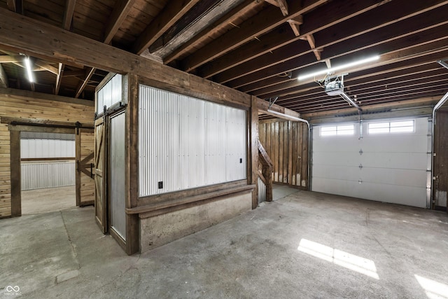 garage featuring a garage door opener