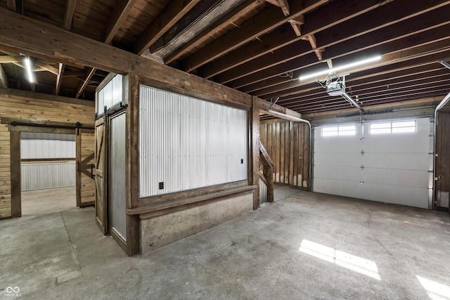 9462 N Rushville Rd, Knightstown, IN 46148 - garage featuring a garage door opener