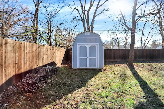 view of outbuilding featuring a lawn