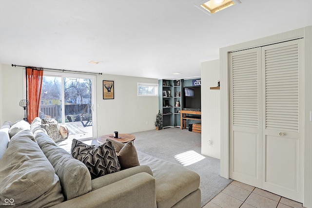 living room featuring light tile patterned flooring