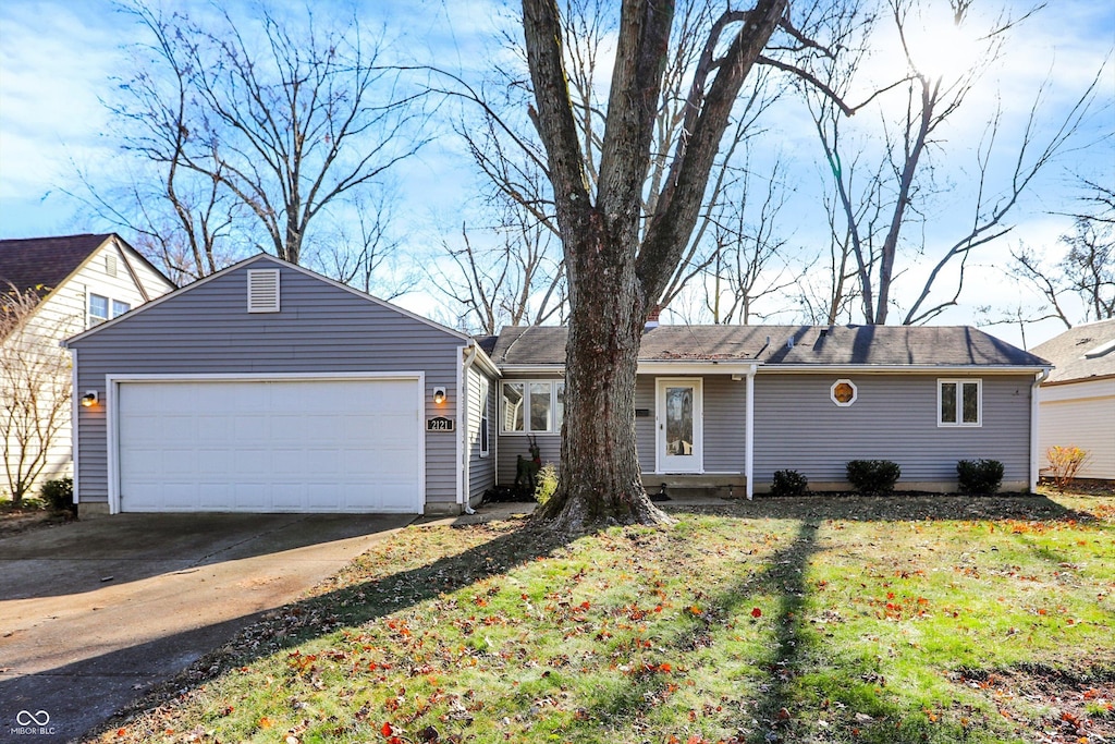 ranch-style home with a garage