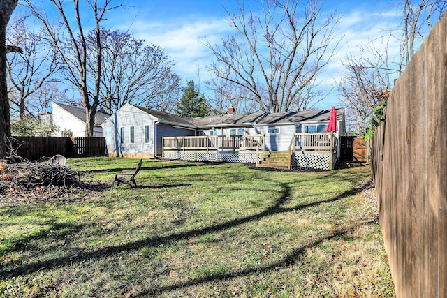 view of yard featuring a wooden deck