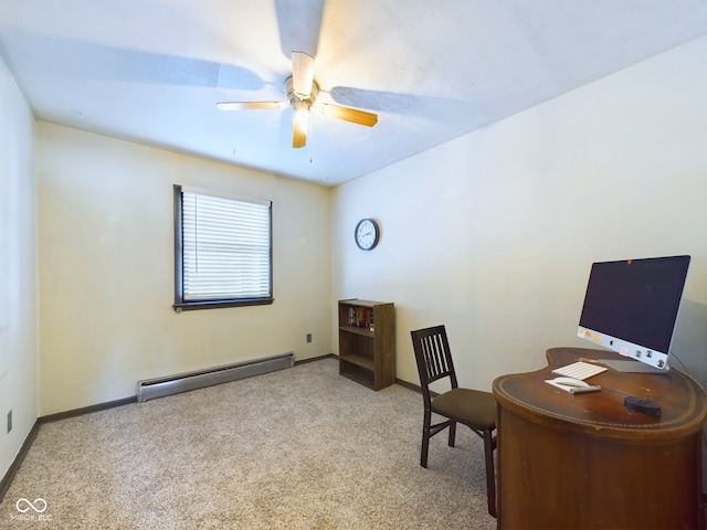 carpeted office featuring a baseboard heating unit and ceiling fan