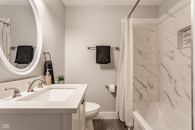 full bathroom featuring shower / bathtub combination with curtain, wood-type flooring, vanity, and toilet