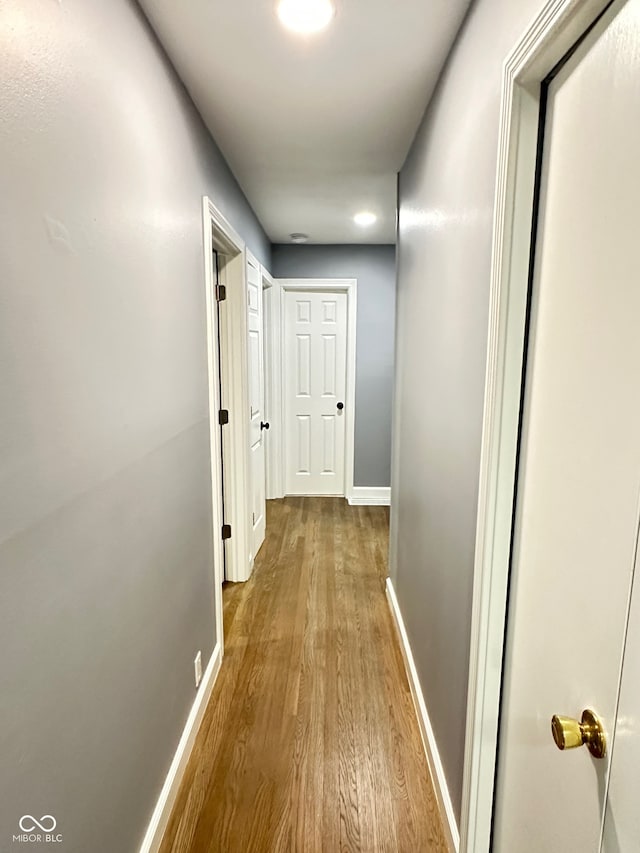 corridor featuring light hardwood / wood-style floors