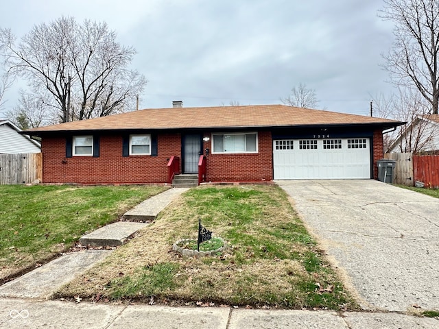 single story home with a front yard and a garage