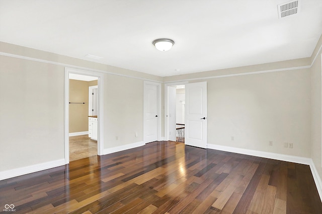 spare room featuring hardwood / wood-style floors