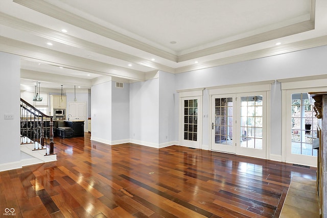 spare room with dark hardwood / wood-style flooring, crown molding, french doors, and sink