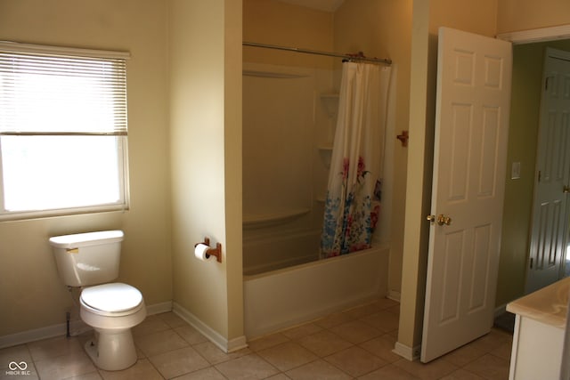 bathroom featuring tile patterned floors, shower / bath combo, and toilet