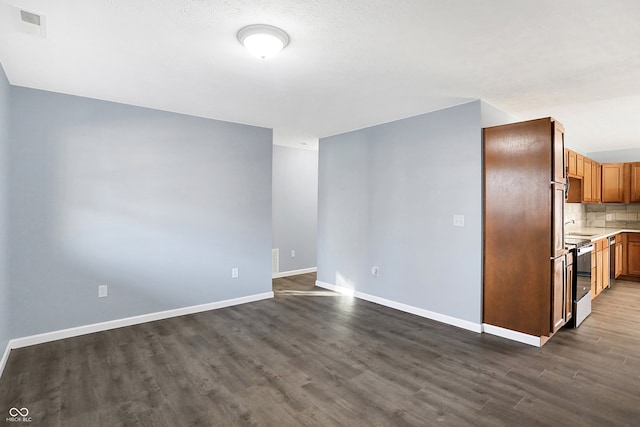 interior space with dark hardwood / wood-style flooring and sink