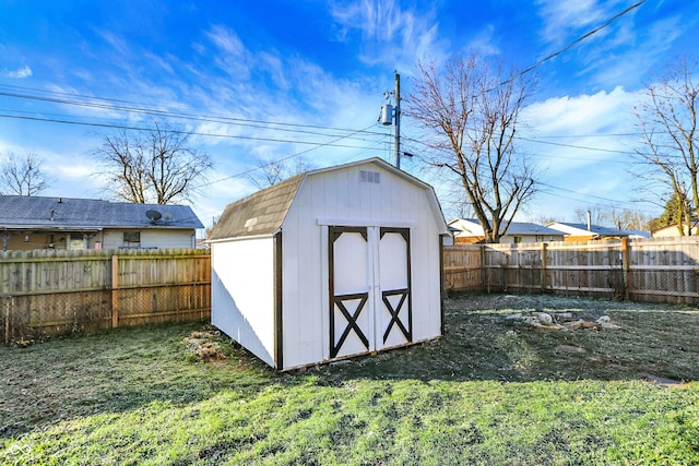 view of outbuilding with a lawn