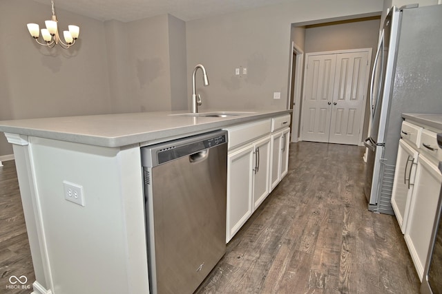 17345 Northam Dr, Westfield, IN 46074 - kitchen featuring white cabinets, appliances with stainless steel finishes, a sink, and dark wood-style floors