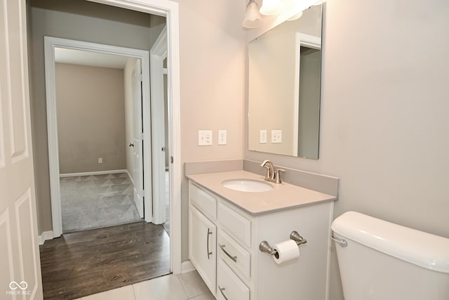 17345 Northam Dr, Westfield, IN 46074 - half bathroom featuring wood finished floors, toilet, and vanity