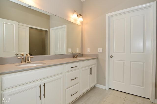 17345 Northam Dr, Westfield, IN 46074 - full bath featuring tile patterned flooring, baseboards, a sink, and double vanity