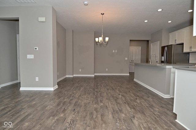 17345 Northam Dr, Westfield, IN 46074 - kitchen featuring dark wood-style floors, recessed lighting, a chandelier, white cabinetry, and stainless steel refrigerator with ice dispenser