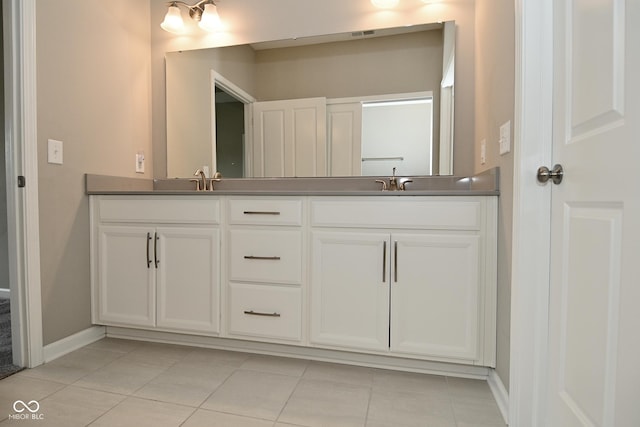 17345 Northam Dr, Westfield, IN 46074 - bathroom featuring baseboards, tile patterned flooring, and double vanity