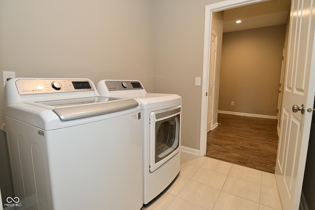 17345 Northam Dr, Westfield, IN 46074 - laundry room featuring recessed lighting, laundry area, light tile patterned floors, baseboards, and washer and dryer