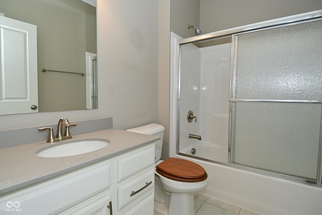 17345 Northam Dr, Westfield, IN 46074 - full bathroom with toilet, vanity, tile patterned floors, and shower / bath combination with glass door