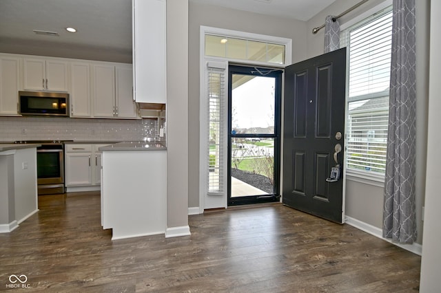17345 Northam Dr, Westfield, IN 46074 - entrance foyer featuring visible vents, baseboards, and dark wood-type flooring