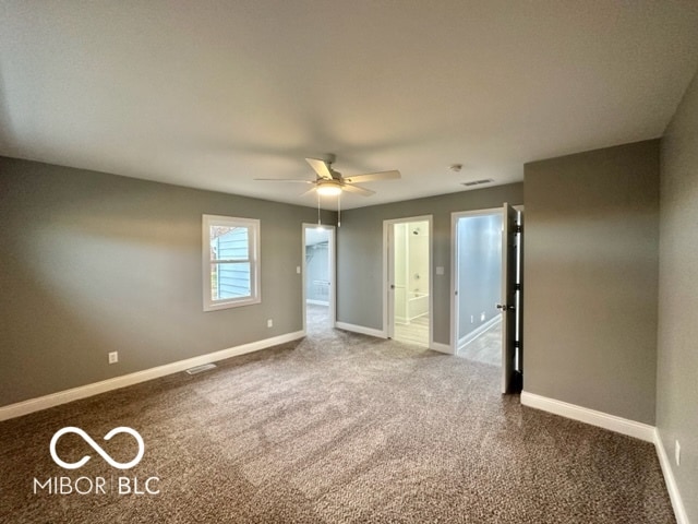 unfurnished bedroom with carpet flooring and ceiling fan