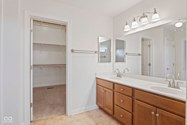 bathroom featuring tile patterned floors and vanity