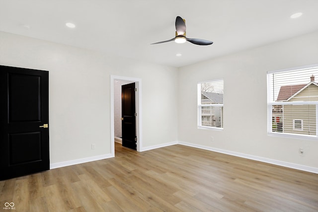 unfurnished bedroom with light hardwood / wood-style flooring and ceiling fan