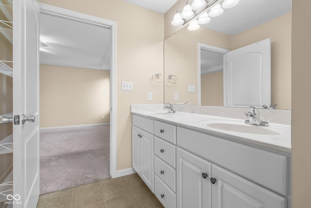 bathroom with vanity and tile patterned floors