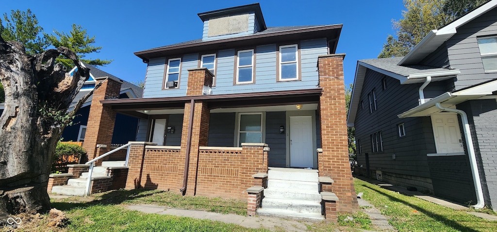 view of front of home with covered porch