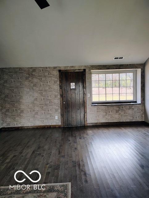 interior space with dark wood-type flooring