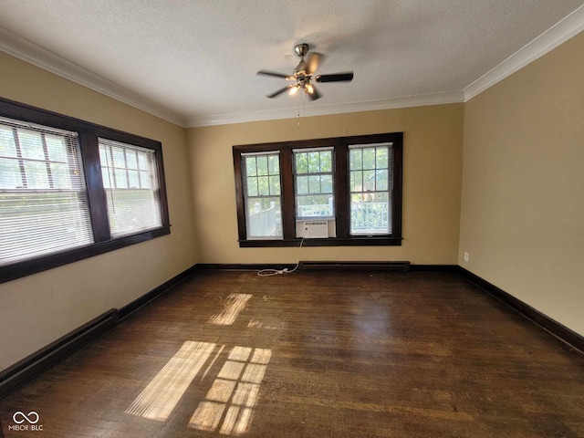 empty room with crown molding, dark hardwood / wood-style flooring, ceiling fan, and a textured ceiling