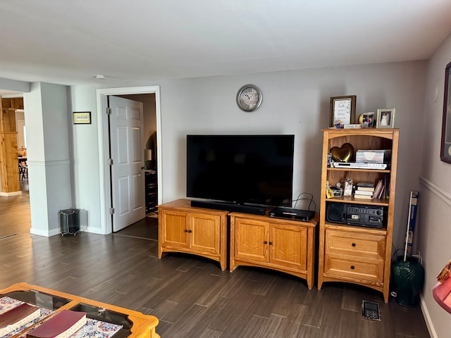 living room featuring dark hardwood / wood-style floors