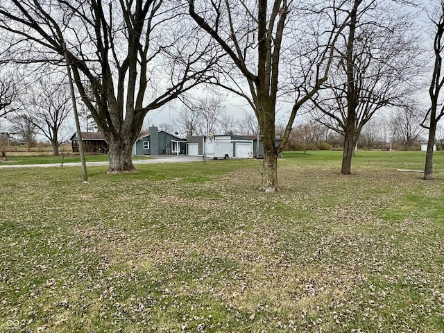 view of yard with a garage