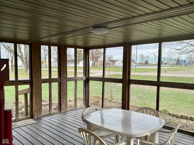 unfurnished sunroom featuring plenty of natural light